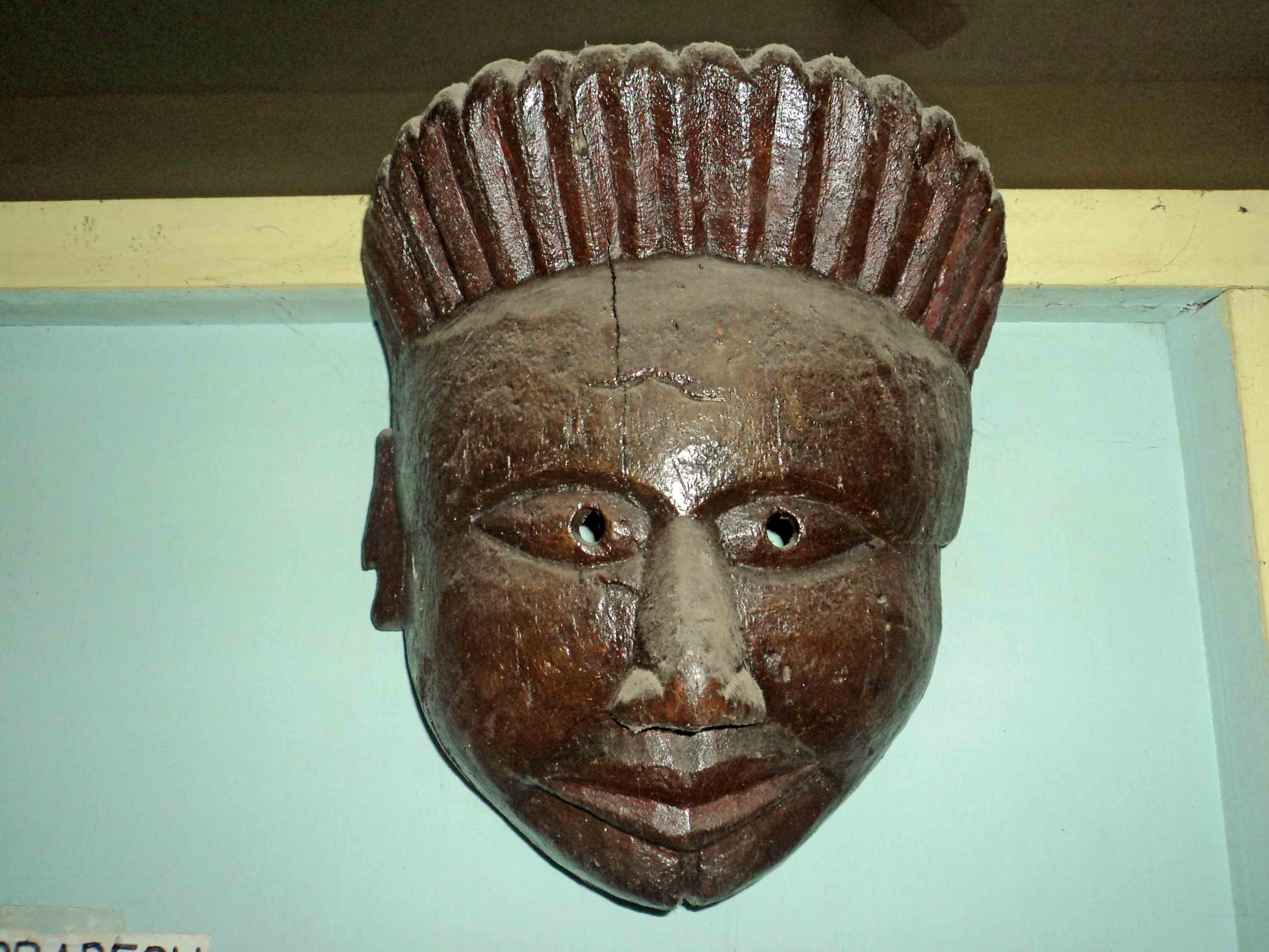 An image of a mask of a human figurine of northeast India