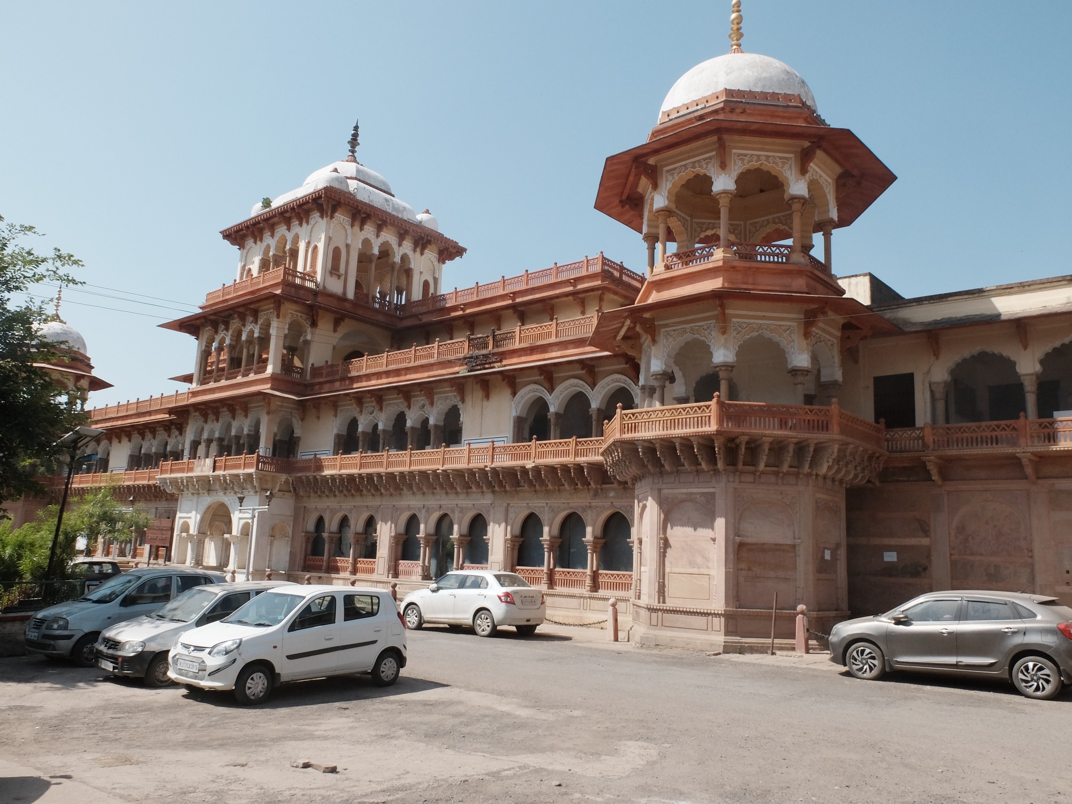 The Garh Palace was built between 1838 and 1845 by the first ruler of the newly independent Jhalawar State, Raj Rana Madan Singh Jhala. The State was  formerly part of Kotah to the north. It is located in the centre of the old city and access is difficult but well worth the effort. Between 1952 and 2008 the Garh Palace was used as the District Collectorate but is now being restored to its former glory.